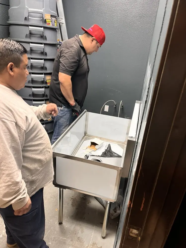 Commercial plumbing and sink installation in Flanders